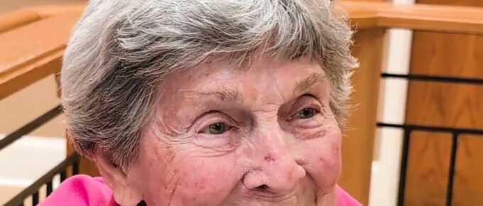 Smiling resident during decoupage seashell craft day at Brookstone Terrace of Clemmons