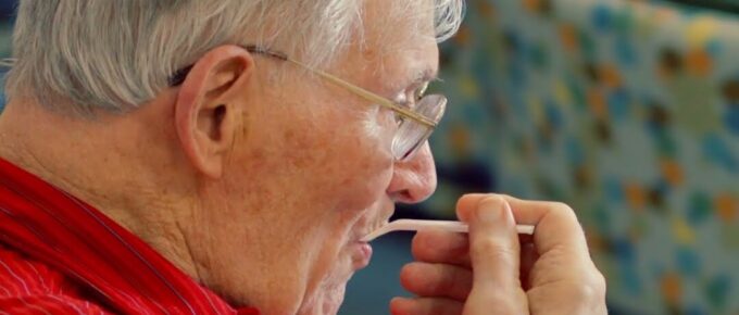 Resident enjoying the bingo and ice cream social at Brookstone Terrace of Greensboro
