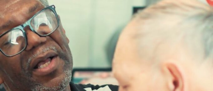 Chaplain Eddie Bowen giving a resident a shave in the barber shop at Brookstone Terrace of Woodruff, SC