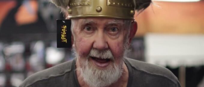 Brookstone Terrace of Greensboro resident smiling in a horned Viking helmet at Spirit Halloween